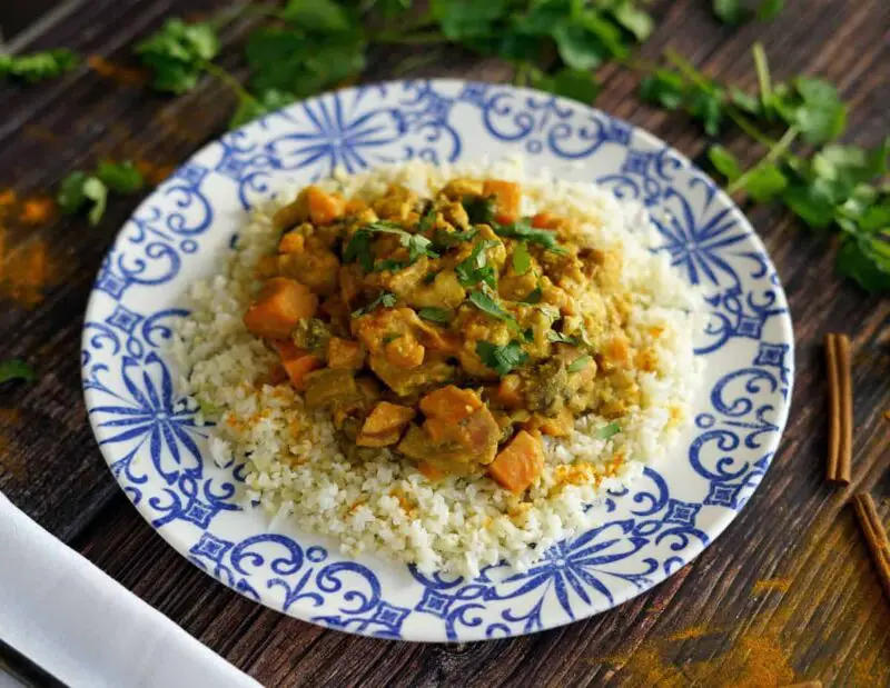 AIP moroccan chicken stew on a blue and white plate