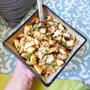 chicken kelaguen in a tan square bowl