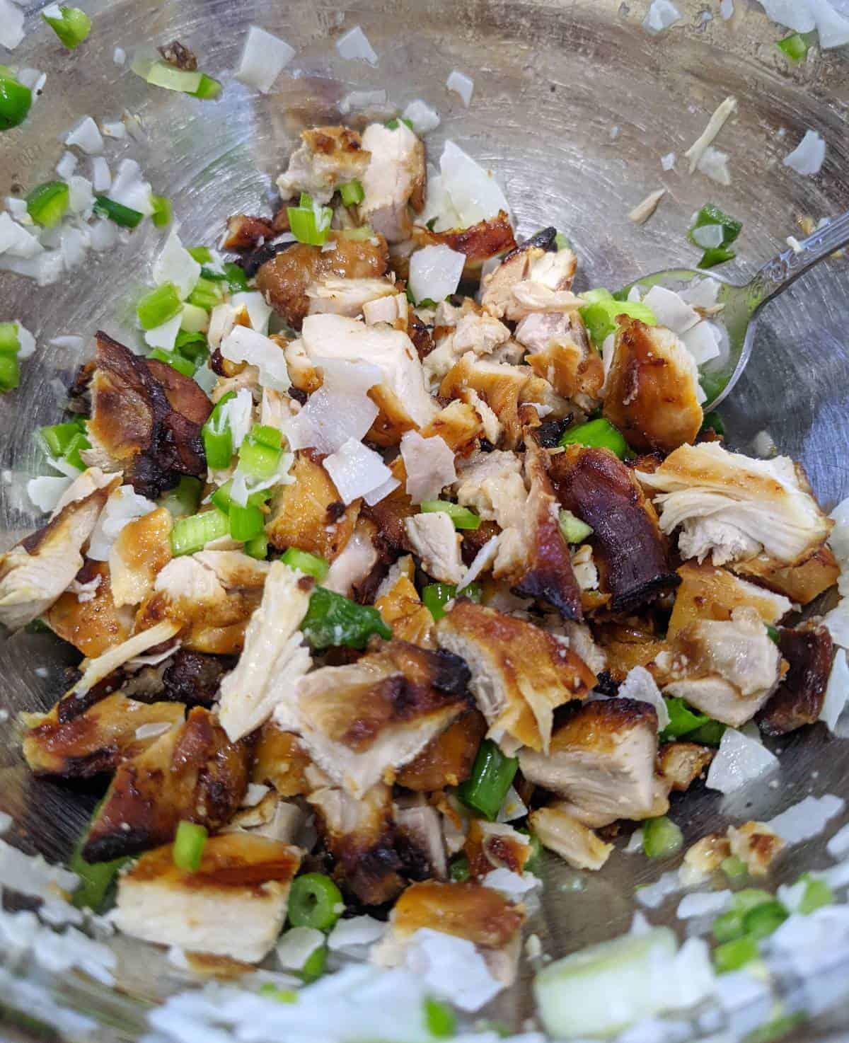 chicken kelaguen in a metal bowl