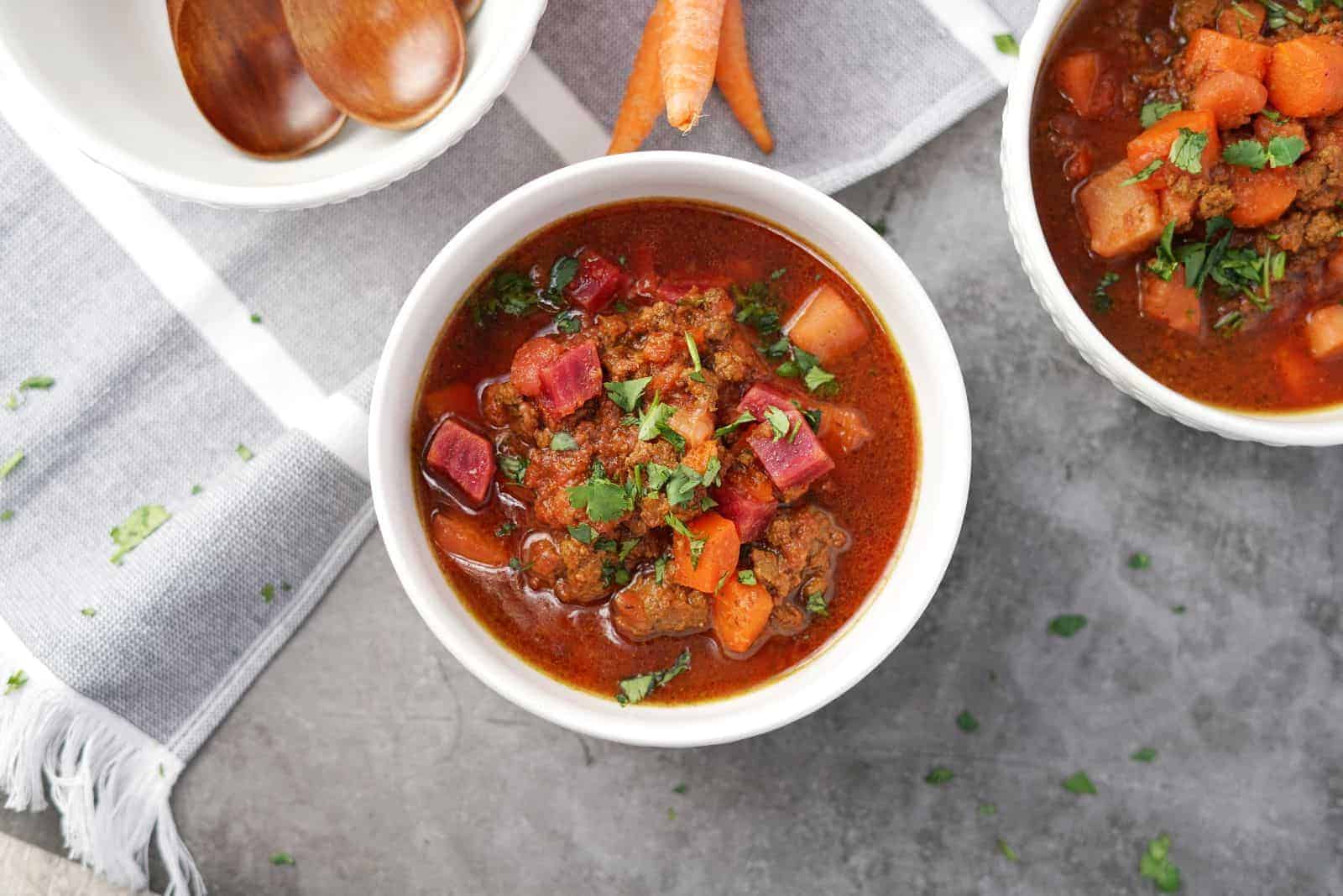 paleo aip chili in two white bowl