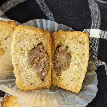 sausage stuffed biscuit cut in half