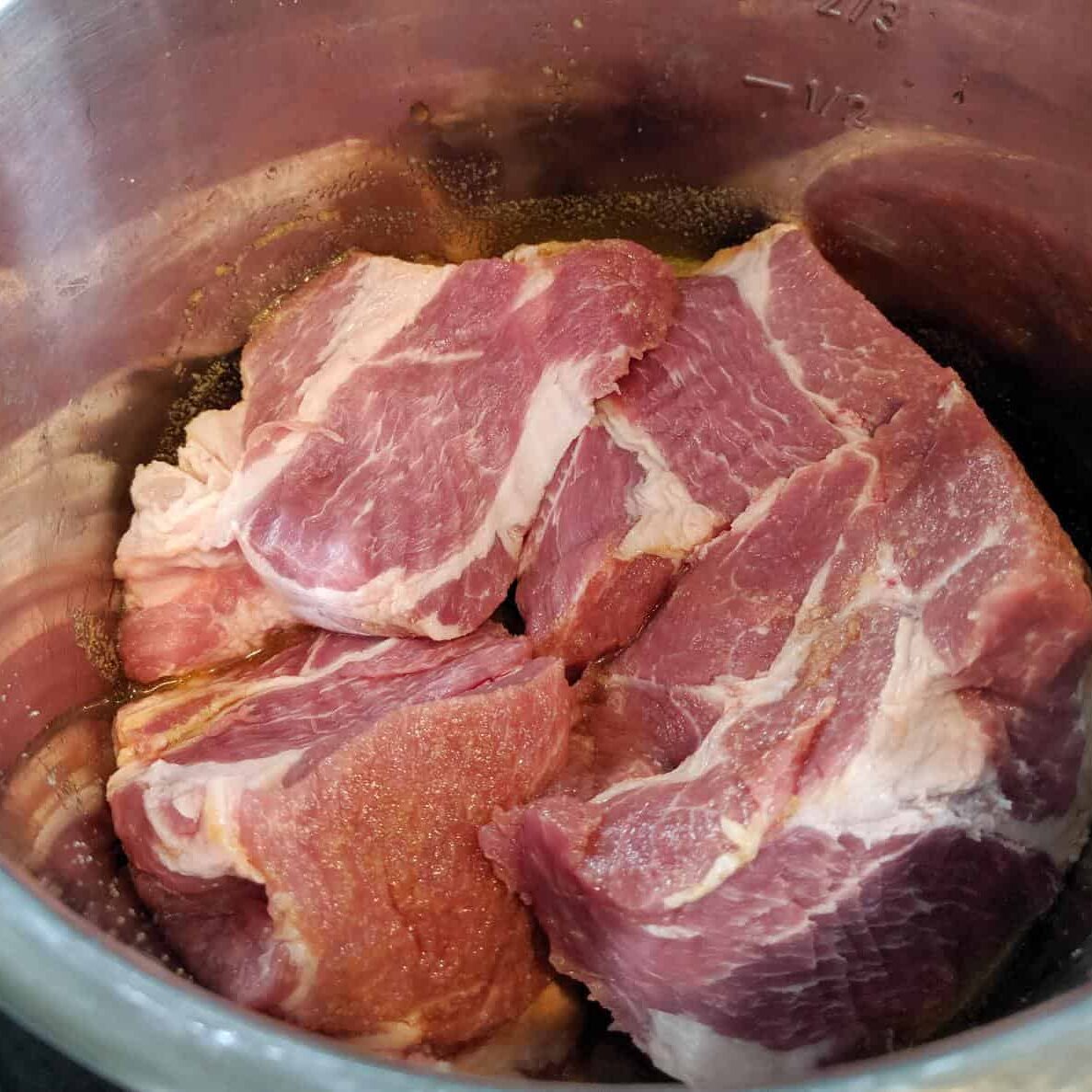Raw pork butt in the instant pott.