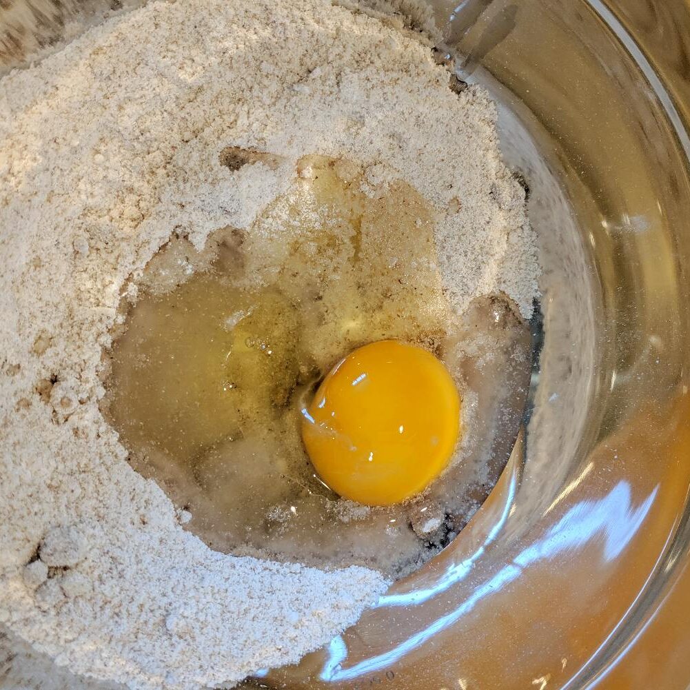 Egg added to dry ingredients.